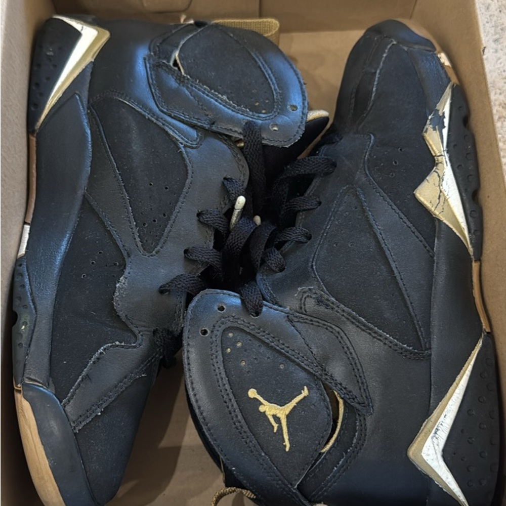 Jordan Air 7 Retro Black and Metallic Gold Sneakers